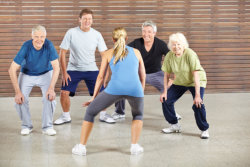 elderly group doing physical exercise